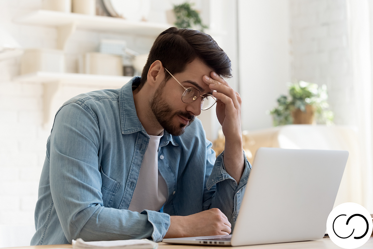 Mournful man apple laptop